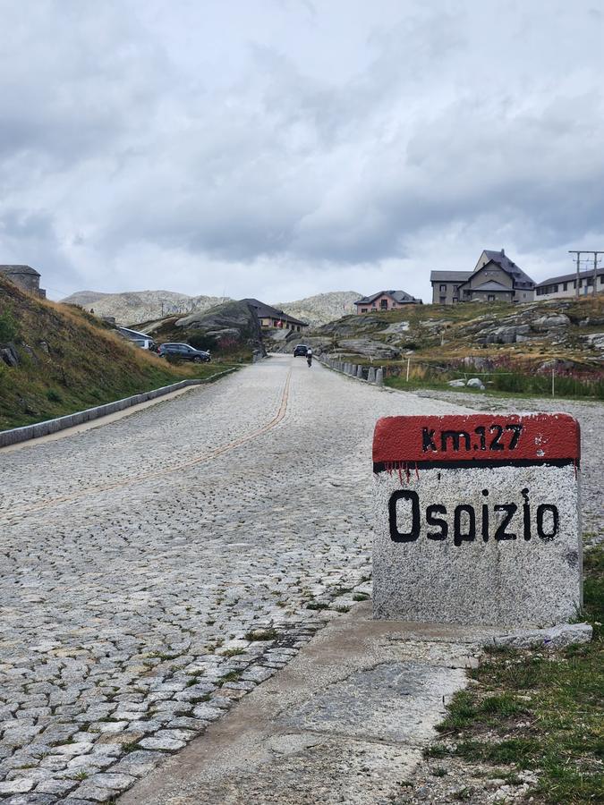 The Ospizio marker stone at the top of the Gotthard Pass