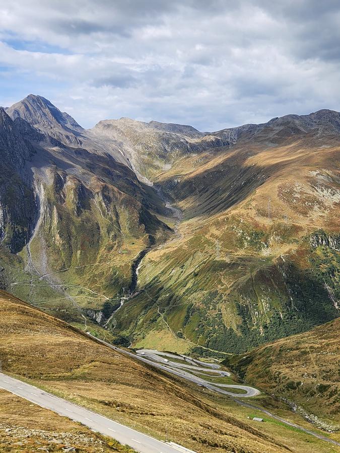 The Nufenen road snaking down the Valais side