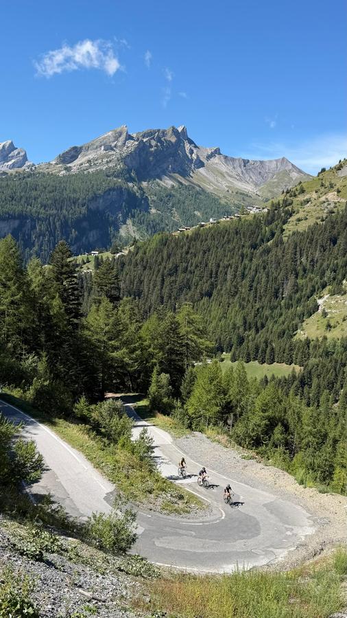 A group of riders on the Sanetsch hairpins, seen from above