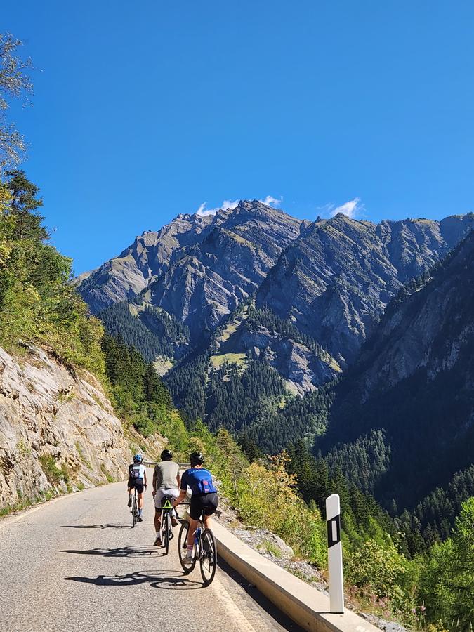 Three riders climbing the Col du Sanetsch above Savièse